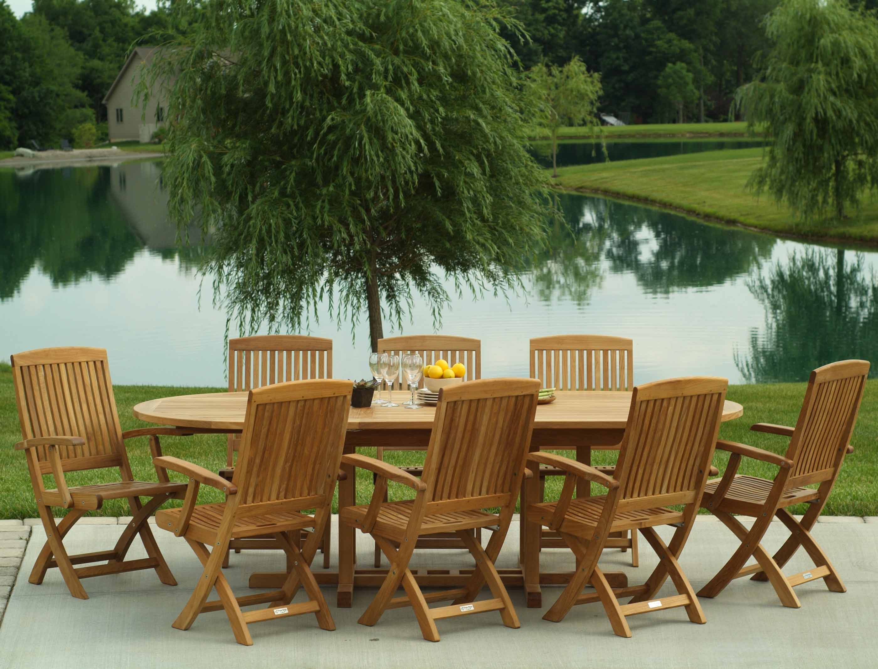 Three Birds Casual Teak Chelsea Round Outdoor Eight Braxton Armchairs Extension Set